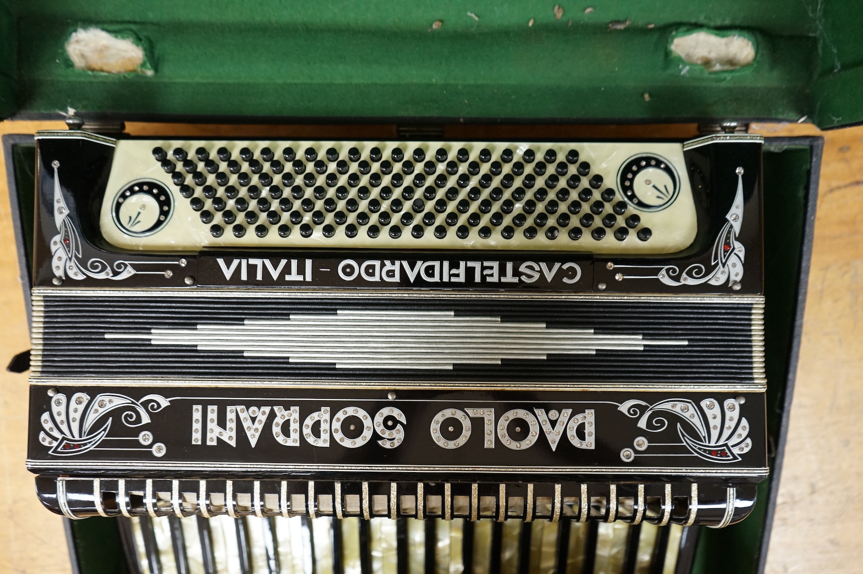 A cased Paolo Soprani Castelfidardo Italia piano accordion.